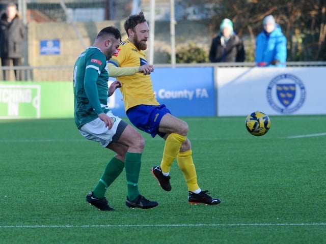 Action from Lancing's 3-2 win over Ashford United on Saturday. Picture by Stephen Goodger