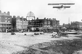 A biplane flying over Worthing when The Kursaal was being built by Carl Seebold in 1911
