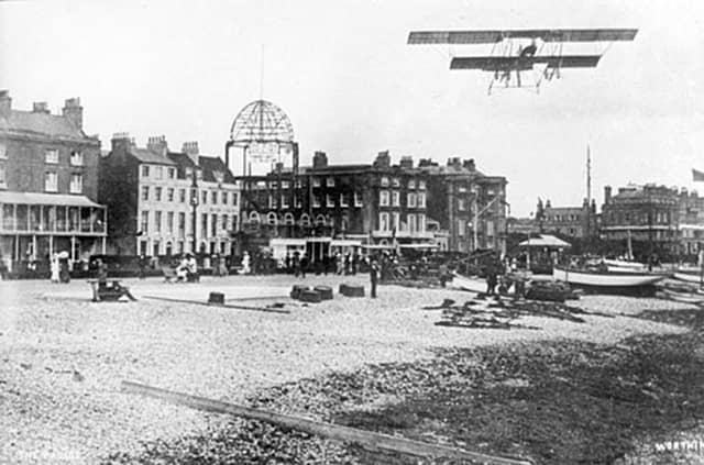 A biplane flying over Worthing when The Kursaal was being built by Carl Seebold in 1911