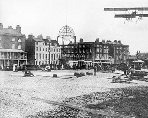 A biplane flying over Worthing when The Kursaal was being built by Carl Seebold in 1911