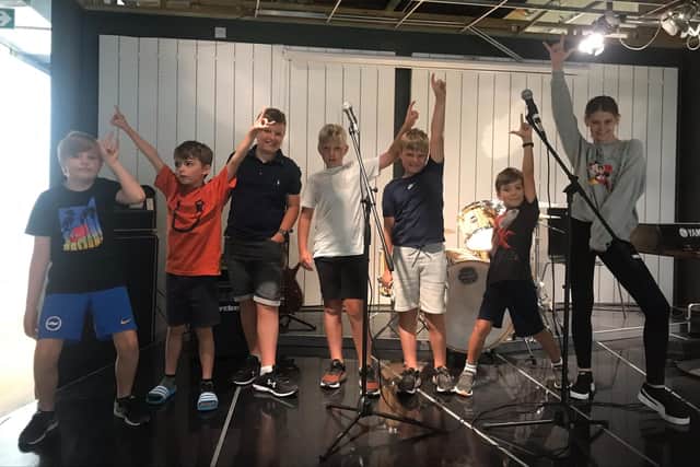 Children from Andy's Angels Grief Play Cafe on stage at AudioActive Worthing