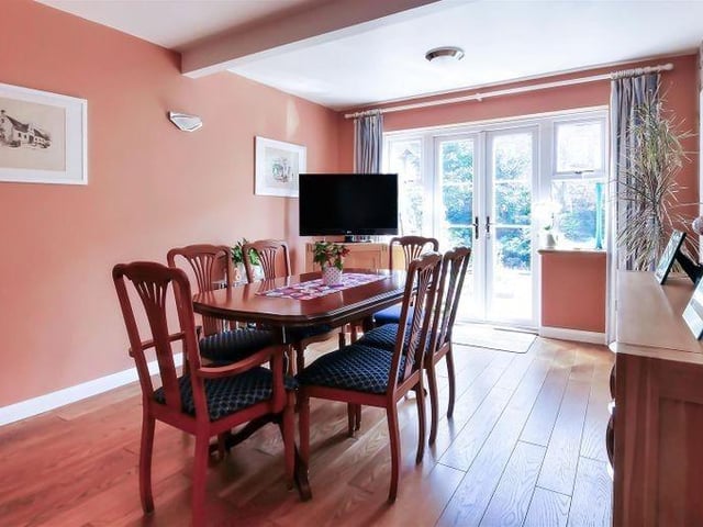 There is a separate dining room with access to the garden
