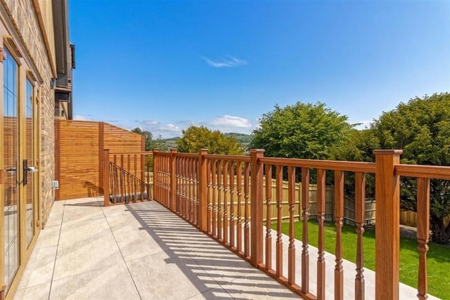 Offers in excess of £900,000 are invited for this new luxury property in Mill Lane, High Salvington. It has beautiful views over the South Downs, versatile and spacious accommodation.
