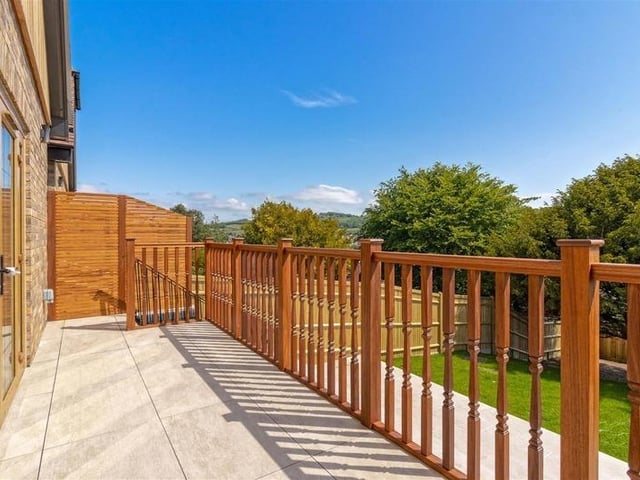 Offers in excess of £900,000 are invited for this new luxury property in Mill Lane, High Salvington. It has beautiful views over the South Downs, versatile and spacious accommodation.