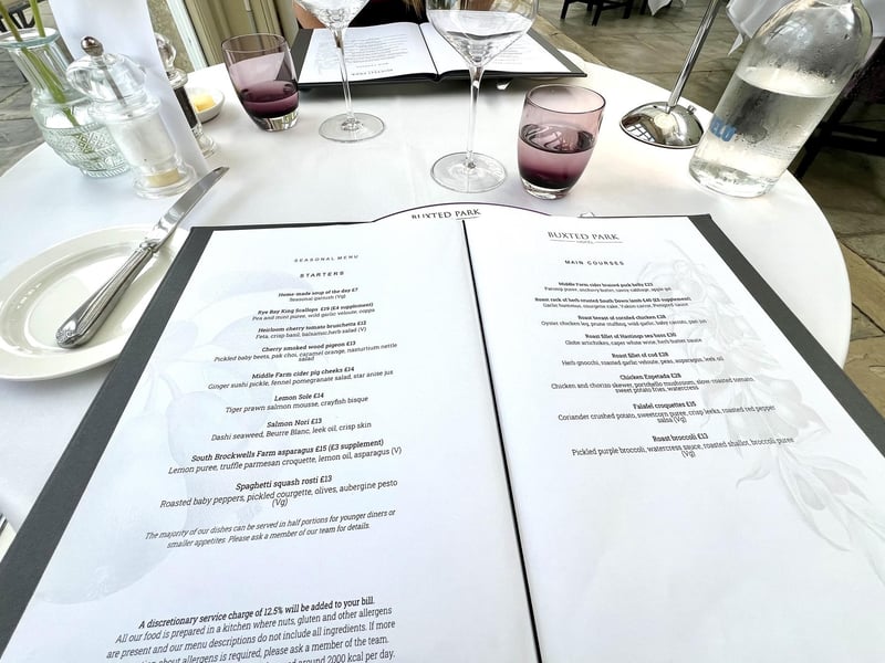 The menu and table decor at the Orangery Restaurant.