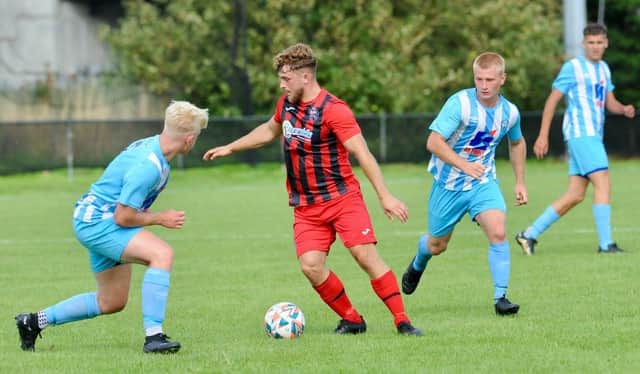 Wick take on Worthing United in Division 1 of the SCFL