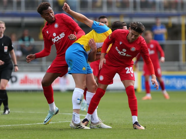 Action from Worthing's 3-0 win at Torquay United which put them top of National League South
