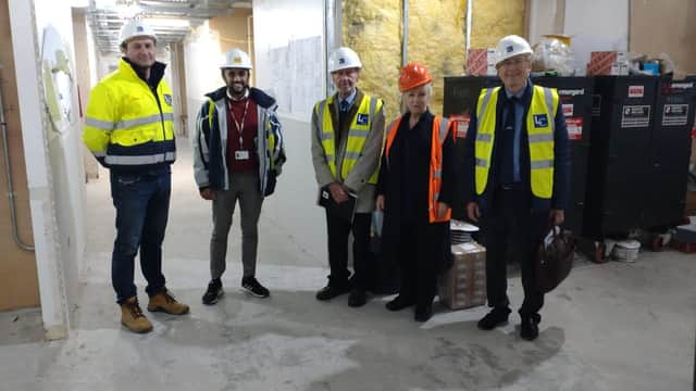 Construction team, with LIBRA Trustee and Midhurst Town Councillor Glyn Upjohn centre, Carole Cobain - Patel, Head of Nursing Haematology, and LIBRA Chairman Andrew Lodge