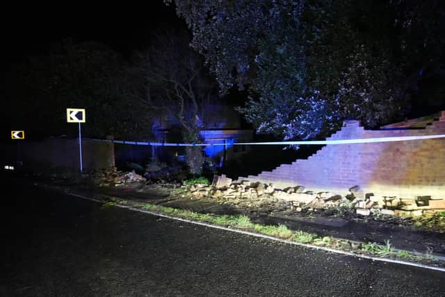 A car collided with a wall during a police pursuit in West Sussex