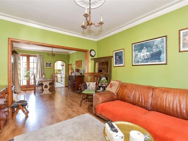 The lovely through lounge/diner has French doors to the garden
