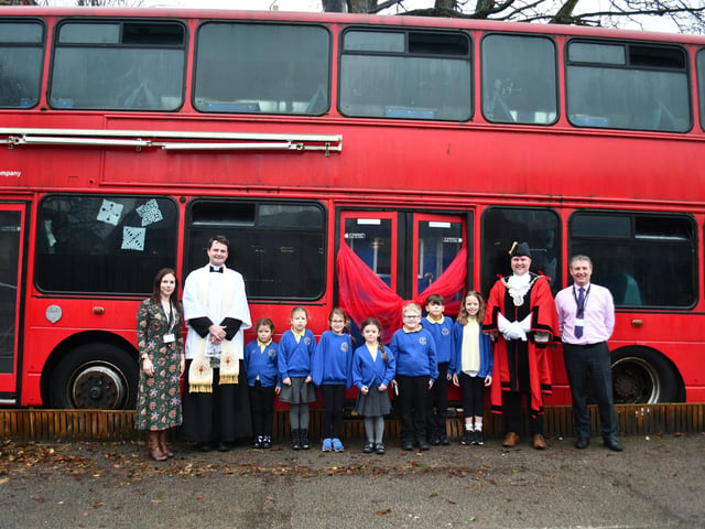 The London bus has pride of place in the playground at Christchurch School