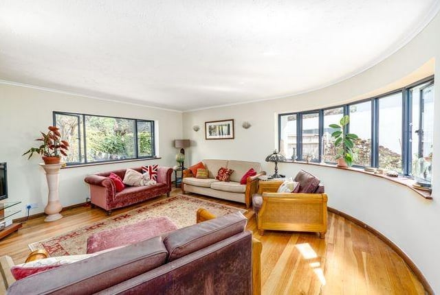 The property has many large windows, making the home bright and spacious.
