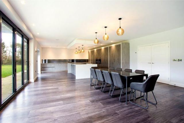 The bi-fold doors lead to a two acre garden