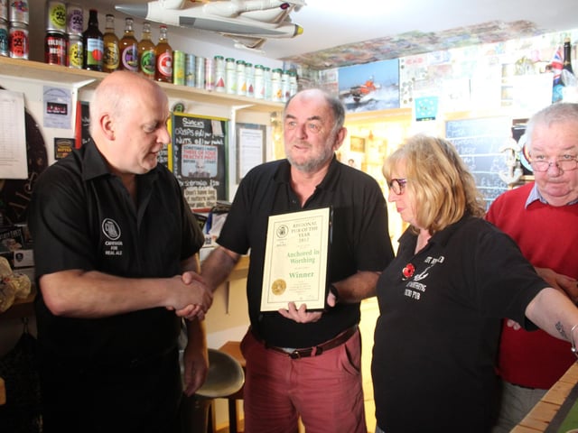 Anchored, in West Buildings, Worthing, was the first micropub in Sussex. It was opened by Nigel Watson in August 2013 and refurbished in 2020. Features include a Tardis-like front door.