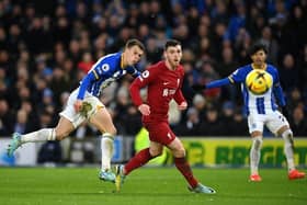 Solly March scores Brighton's second goal against Liverpool in the Premier League at the Amex Stadium