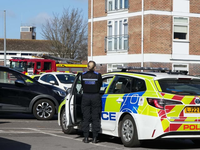A man who was ‘negotiated’ to leave an address in Sussex has been arrested on suspicion of harassment