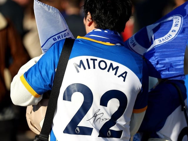 BRIGHTON, ENGLAND - NOVEMBER 13: A Brighton & Hove Albion fan is seen wearing a Kaoru Mitoma shirt outside the stadium prior to the Premier League match between Brighton & Hove Albion and Aston Villa at American Express Community Stadium on November 13, 2022 in Brighton, England. (Photo by Christopher Lee/Getty Images)