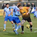 Littlehampton's George Gaskin in the thick of the battle against Lancing | Picture: Stephen Goodger