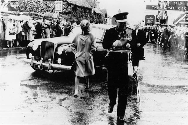 Crowds outside the Royal Oak greet the Queen on her visit to Pevensey in 1966. Picture by the late David Brook