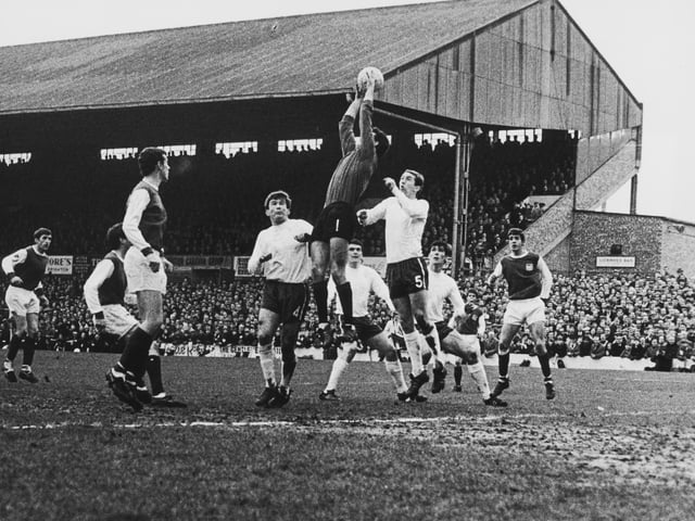 Chelsea goalkeeper Peter Bonetti goes high to collect the ball during an attack by Brighton & Hove Albion FC during an FA Cup 4th round match at Stamford Bridge on 18th February 1967.