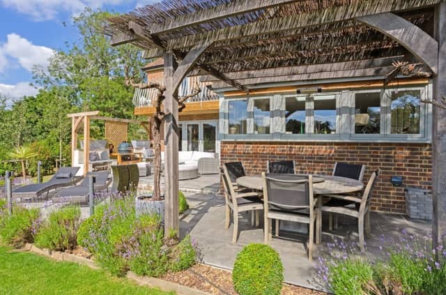 The home offers a wrap around beautifully landscaped garden