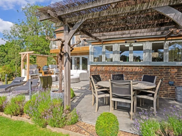 The home offers a wrap around beautifully landscaped garden