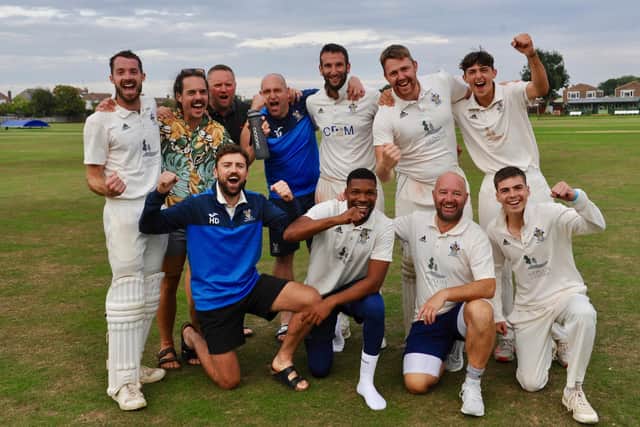 Worthing CC celebrate the win that clinched promotion and the title | Picture: Stephen Goodger