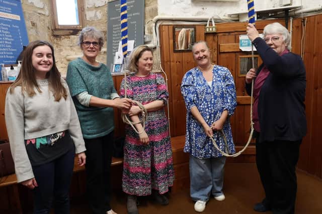 New learner bellringers being taught: Rosie Oldham; Frances Smith, assistant tower captain; Ruth Crocker; Kristy Bovington; and tower captain Val Burgess.