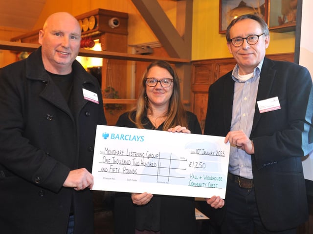 Menshare Listening Group founder Sean Orr, left, and Peter Mayne with judge Bex Bastable, receiving £1,250 for workshops