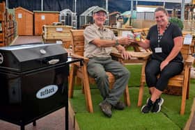  Clive Gravett and Samantha Hart with the donated BBQ and some of the outdoor furniture