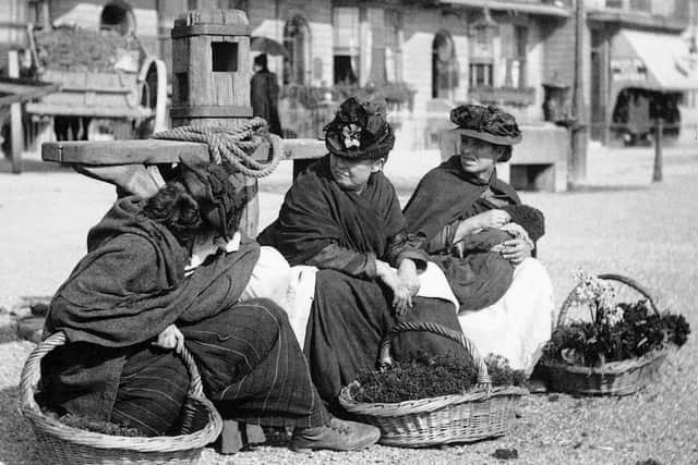 Flower sellers having a rest