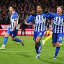 NOTTINGHAM, ENGLAND - NOVEMBER 25:  Joao Pedro of Brighton and Hove Albion celebrates with Evan Ferguson and Lewis Dunk during the Premier League match between Nottingham Forest and Brighton & Hove Albion at City Ground on November 25, 2023 in Nottingham, United Kingdom. (Photo by Marc Atkins/Getty Images)
