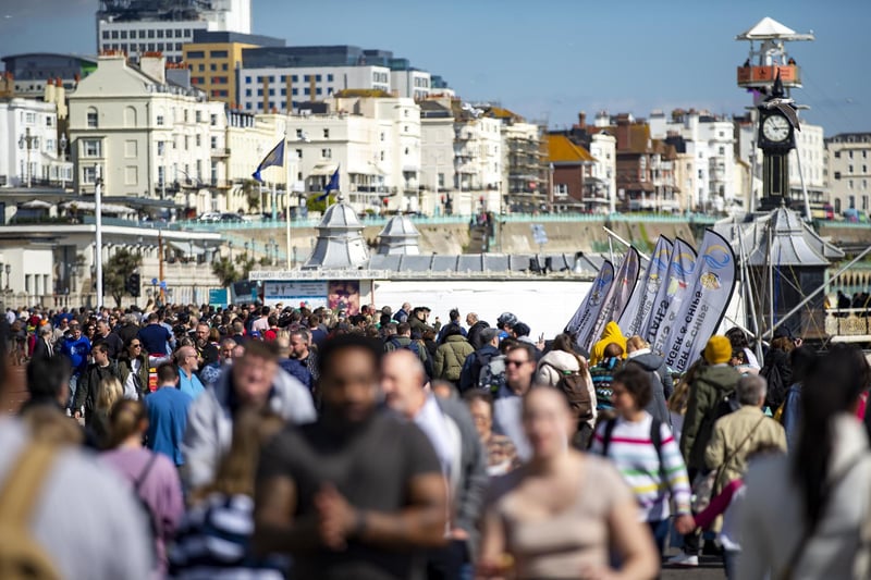 People enjoy the spring sunshine this Good Friday on Brighton seafront in East Sussex.