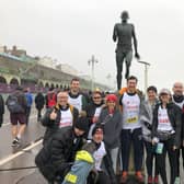 Our Brighton Half Marathon team by the Steve Ovett statue 