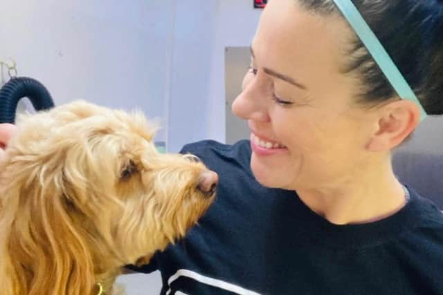 An Eastbourne dog groomer with an online following of more than 100,000 has appeared on TV after almost losing her social media page to scammers. Photo: UGC