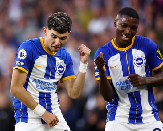 Goalscorer Julio Enciso celebrates with Moises Caicedo during the high-class 1-1 draw with Manchester City (Photo by Clive Rose/Getty Images)