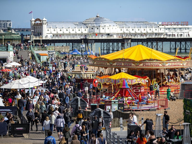 People enjoy the spring sunshine this Good Friday on Brighton seafront in East Sussex.
