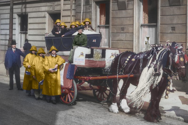 Collecting in Plymouth in 1939, with a horse towing a small boat with six children wearing kapok lifejackets and rain hats