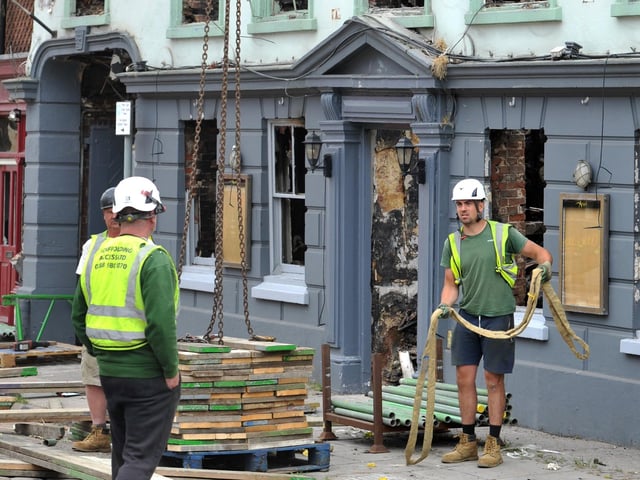 Scaffolding work has started on the Angel Inn in Midhurst. Pic S Robards SR2305311