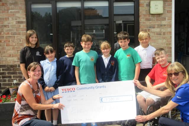 Students were joined by Jackie Hayes from Tesco for the presentation of a £1,500 cheque.