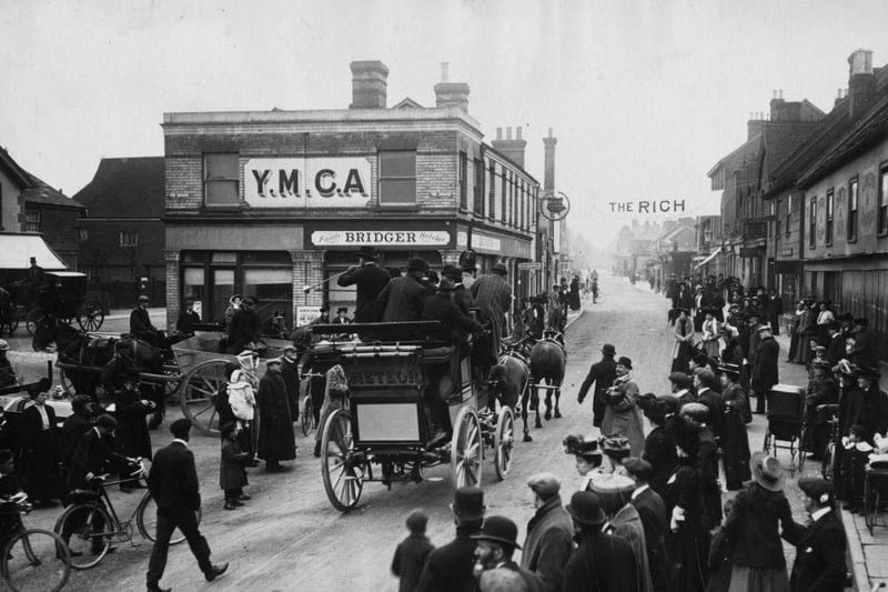 The Vanderbilt coach 'Meteor' drives past the YMCA in Crawley on its first voyage to Brighton on 22nd April 1907.