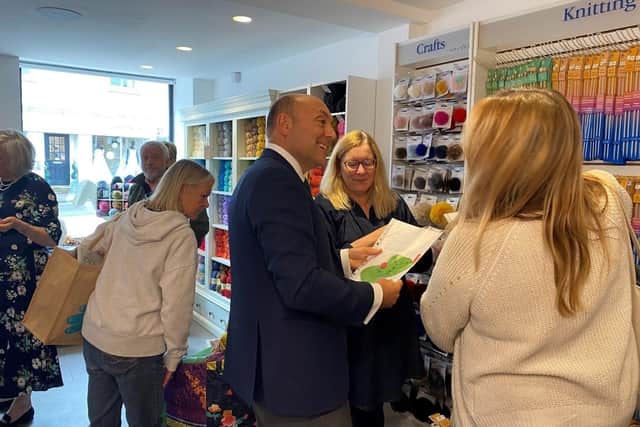 Arundel and South Downs MP Andrew Griffith meeting crafters at the opening of The Sussex Yarn Collection shop in Storrington