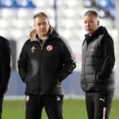 Scott Lindsey and Darren Ferguson on the pitch as the Peterborough-Crawley game is called off | Picture: Peterborough Utd FC