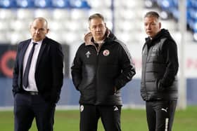 Scott Lindsey and Darren Ferguson on the pitch as the Peterborough-Crawley game is called off | Picture: Peterborough Utd FC