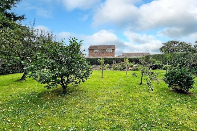 This three-bedroom, detached house with a stunning south-facing garden has come on the market with Graham Butt priced at £695,000