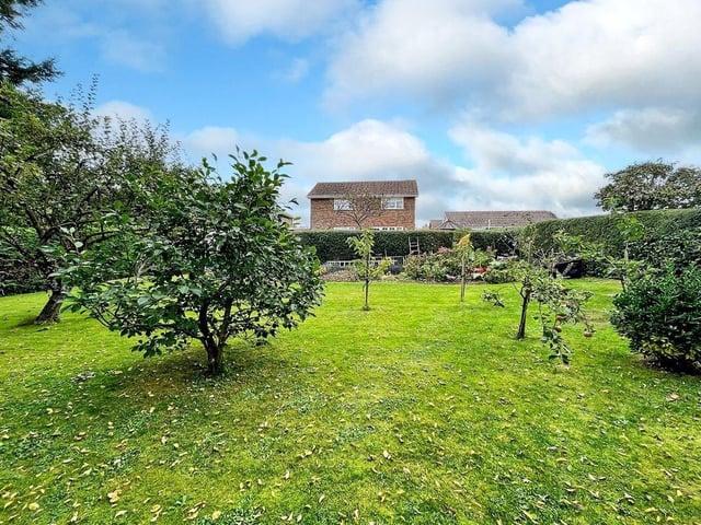 This three-bedroom, detached house with a stunning south-facing garden has come on the market with Graham Butt priced at £695,000