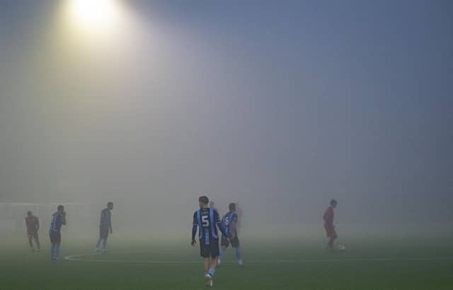 Action from a fog-hit Newhaven v Crowborough clash at Fort Road