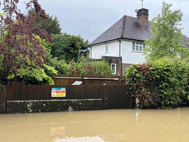 In Pictures: West Sussex road closed following heavy flooding