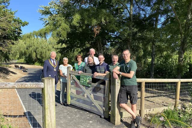 Horsham District Council chairman David Skipp with fellow councillors, members of the parks team and Sally Sanderson, chairman of the Friends of Horsham Park. Photo contributed.