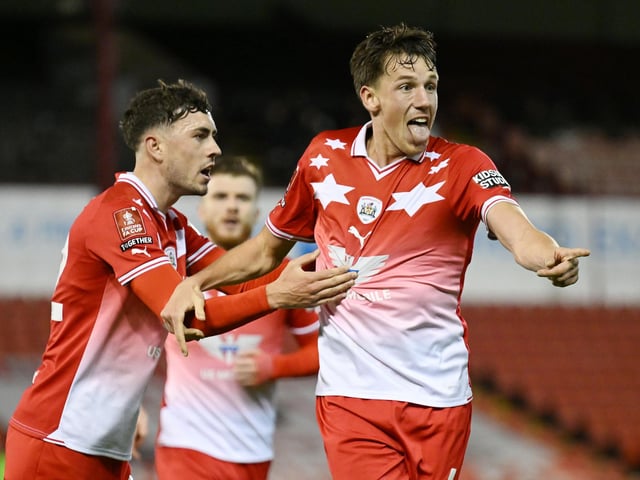 Mael de Gevigney of Barnsley celebrates his goal to make it 3-2 during the Emirates FA Cup First Round match between Barnsley and Horsham at Oakwell Stadium.